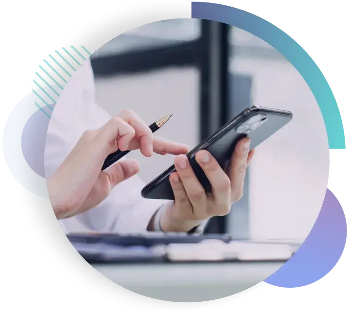 A graphic of someone typing on a mobile handset in an office setting to represent mobile forms